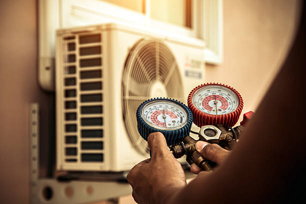 Professional Air Conditioning Service technician working in Union City, OH